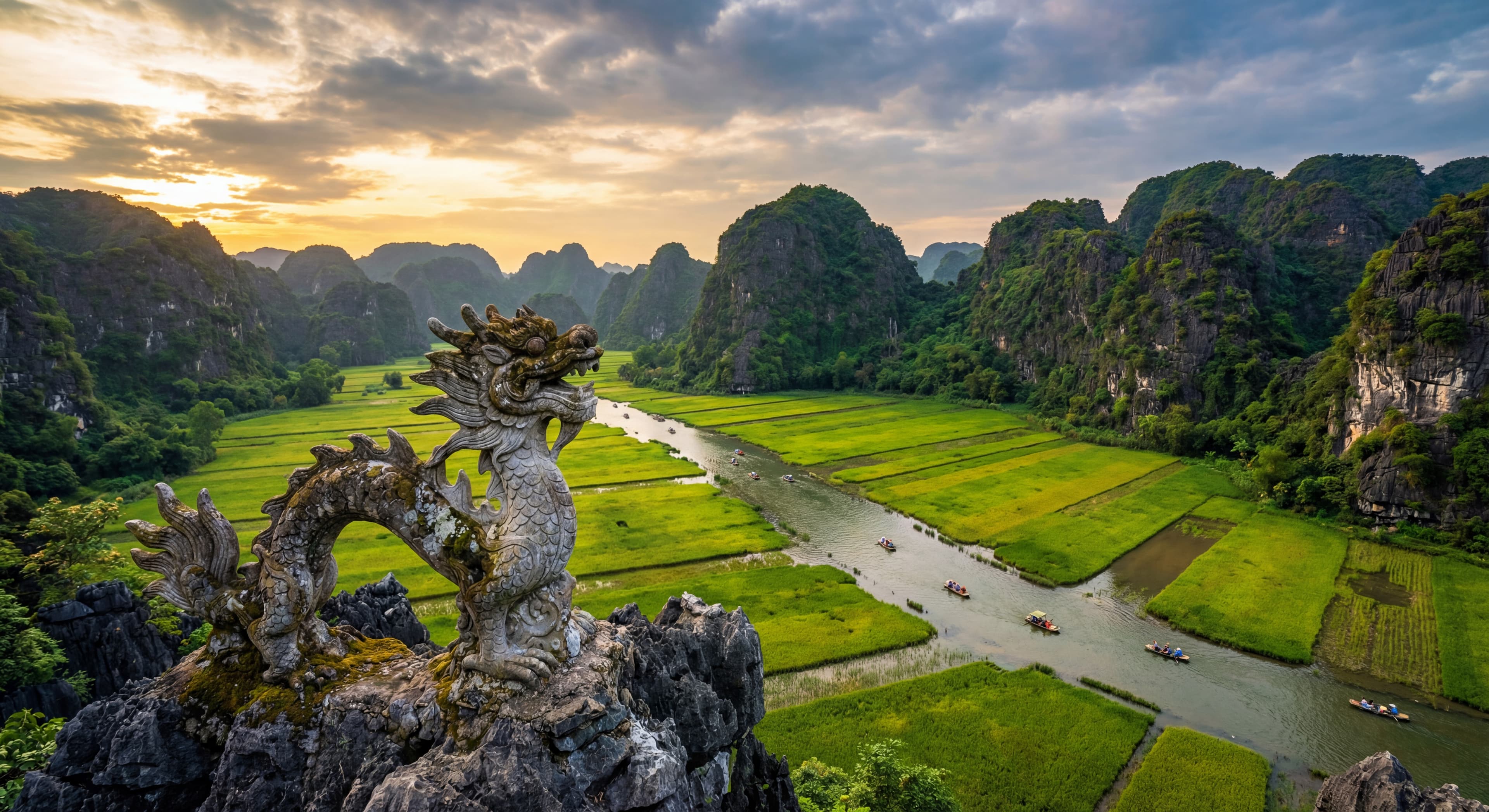 A breathtaking view from the top of Mua Cave mountain looking down at the winding river and rice fie